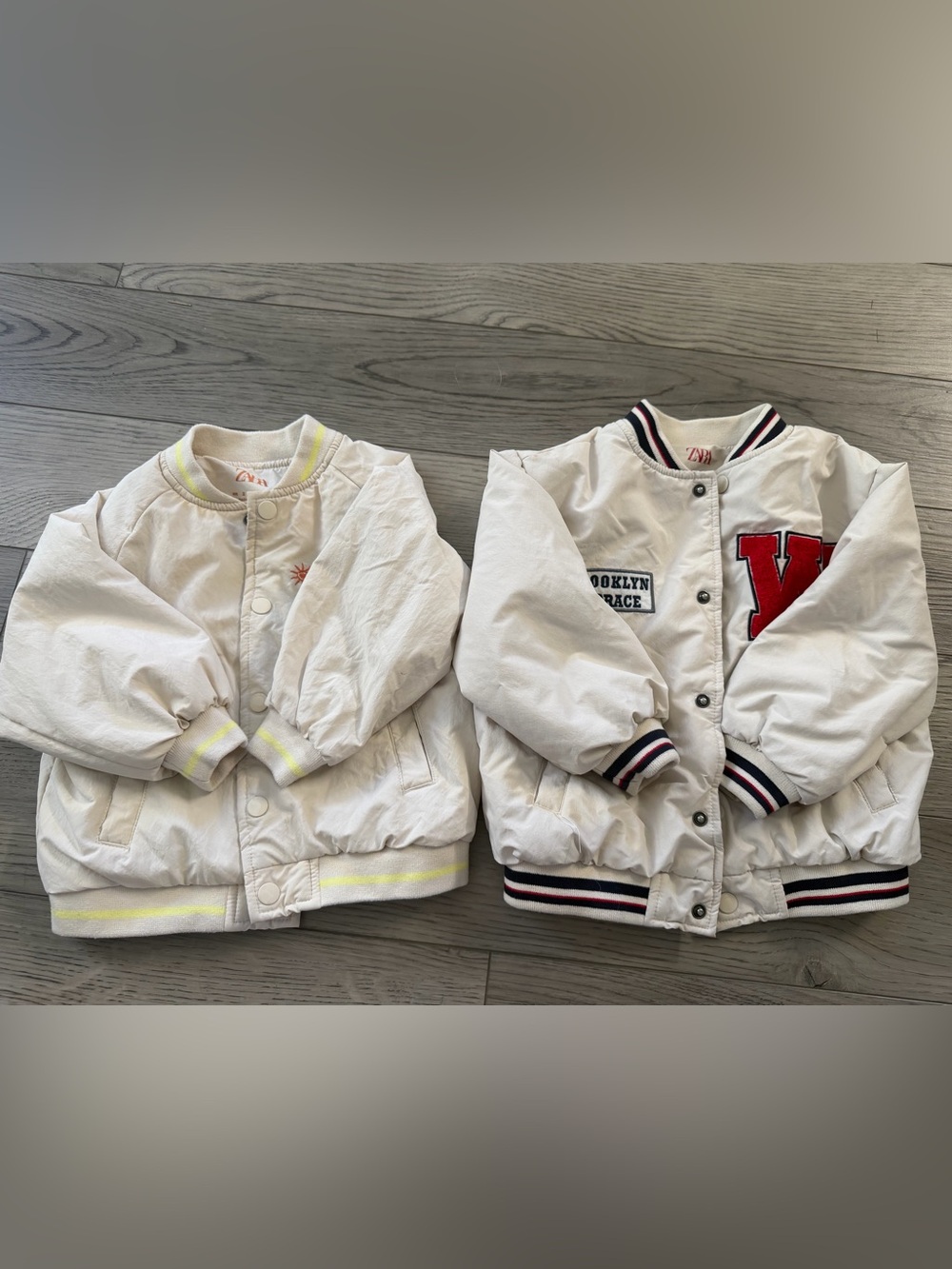 Zara White Kids 2 Bomber Jackets with Red Patch & Yellow Trim, 2t, 3t.